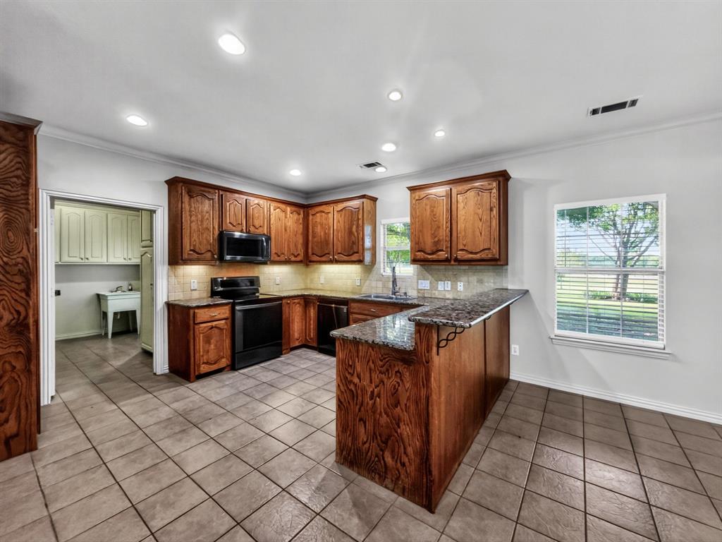 1255 Vineyard Road Gunter, TX 75058 - Photo 8 of 20 Utility room located off kitchen