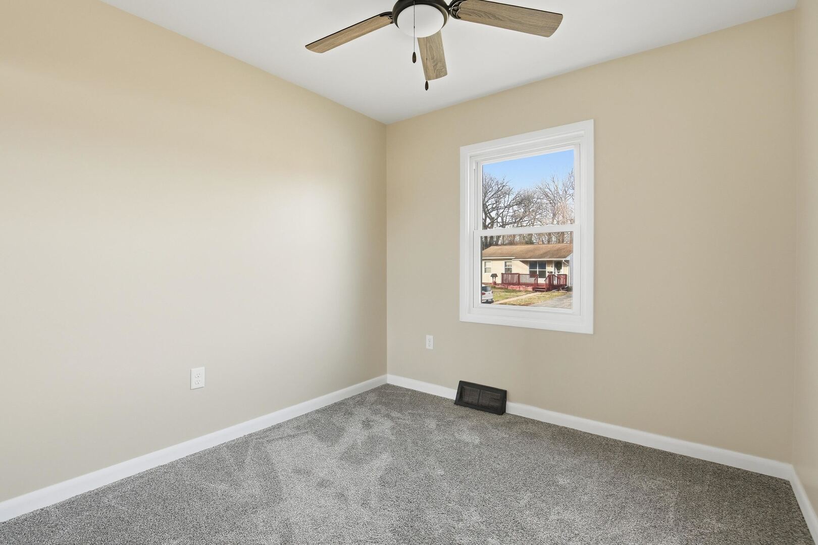 1135 6th Street West Milan, IL 61264 - Photo 21 of 36 an empty room with a window