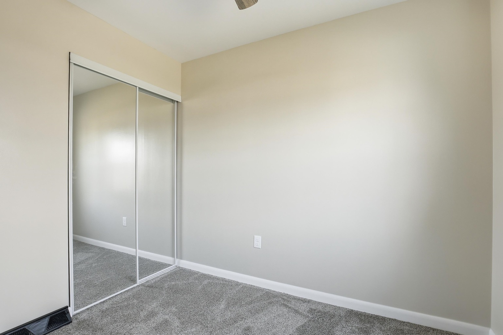 1135 6th Street West Milan, IL 61264 - Photo 22 of 36 an empty room with closet area