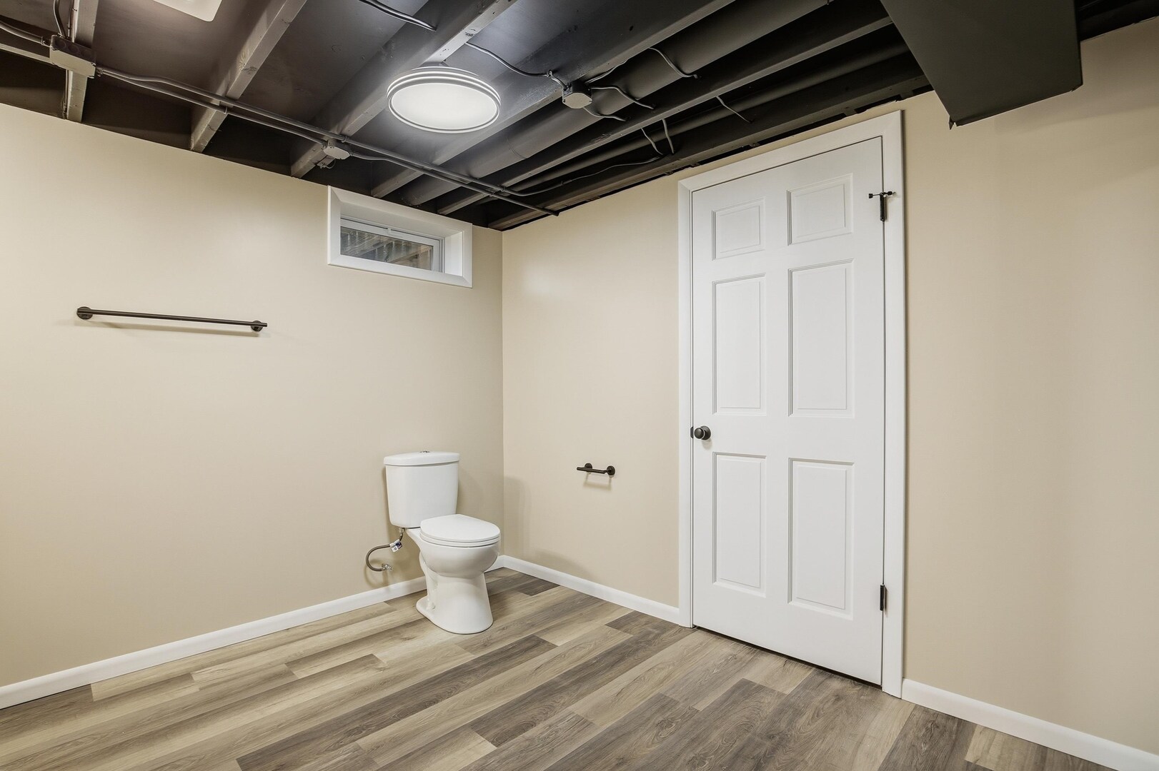 1135 6th Street West Milan, IL 61264 - Photo 32 of 36 a bathroom with a toilet