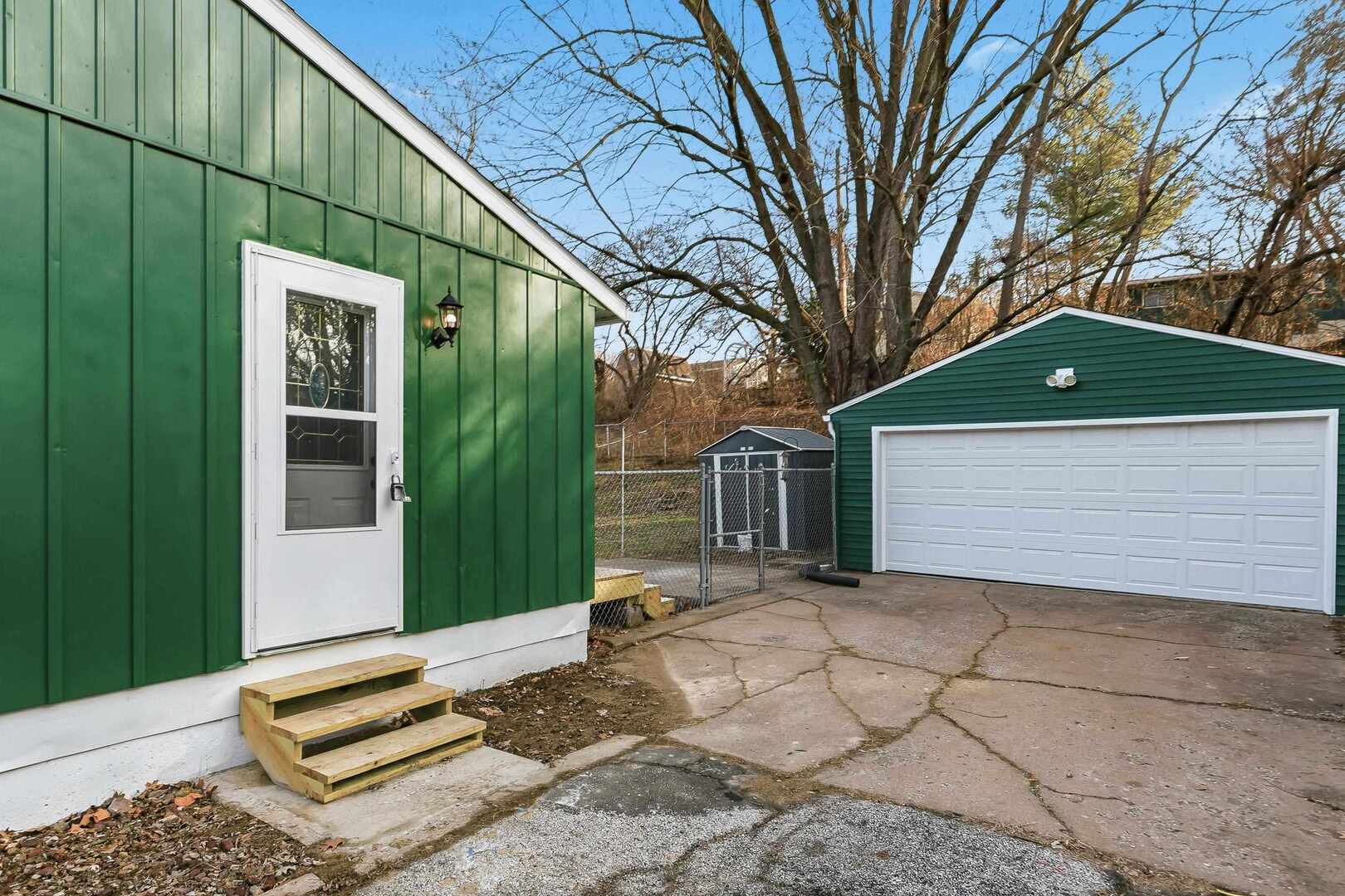 1135 6th Street West Milan, IL 61264 - Photo 33 of 36 a backyard of a house