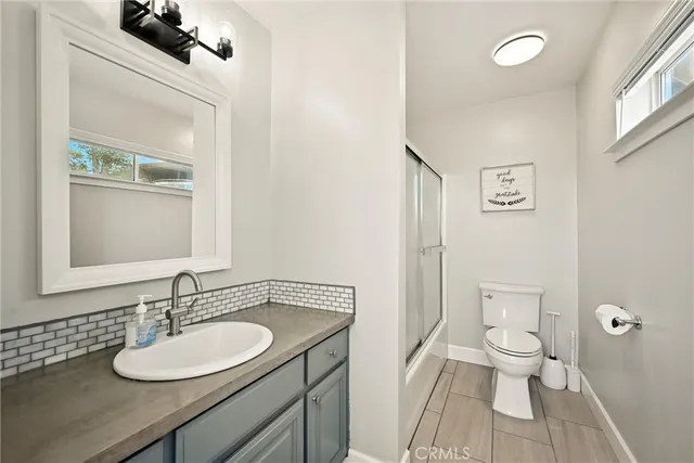 a view of balcony with wooden floor