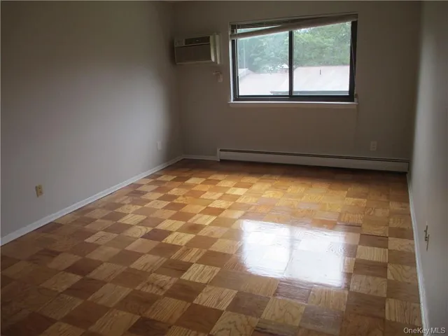 a view of empty room with windows