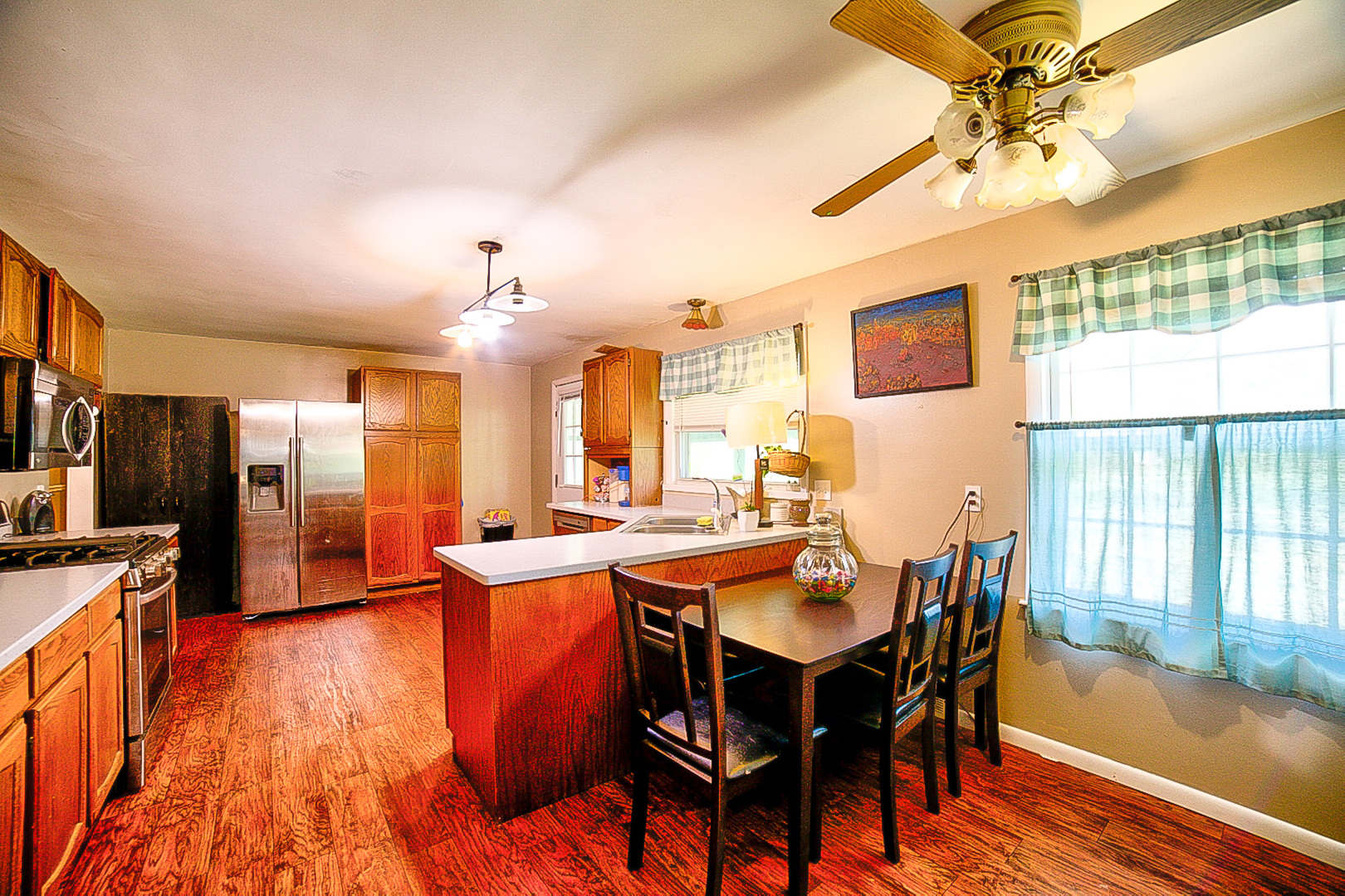 902 South 5th Street Watseka, IL 60970 - Photo 11 of 19 a view of a dining room with furniture and wooden floor