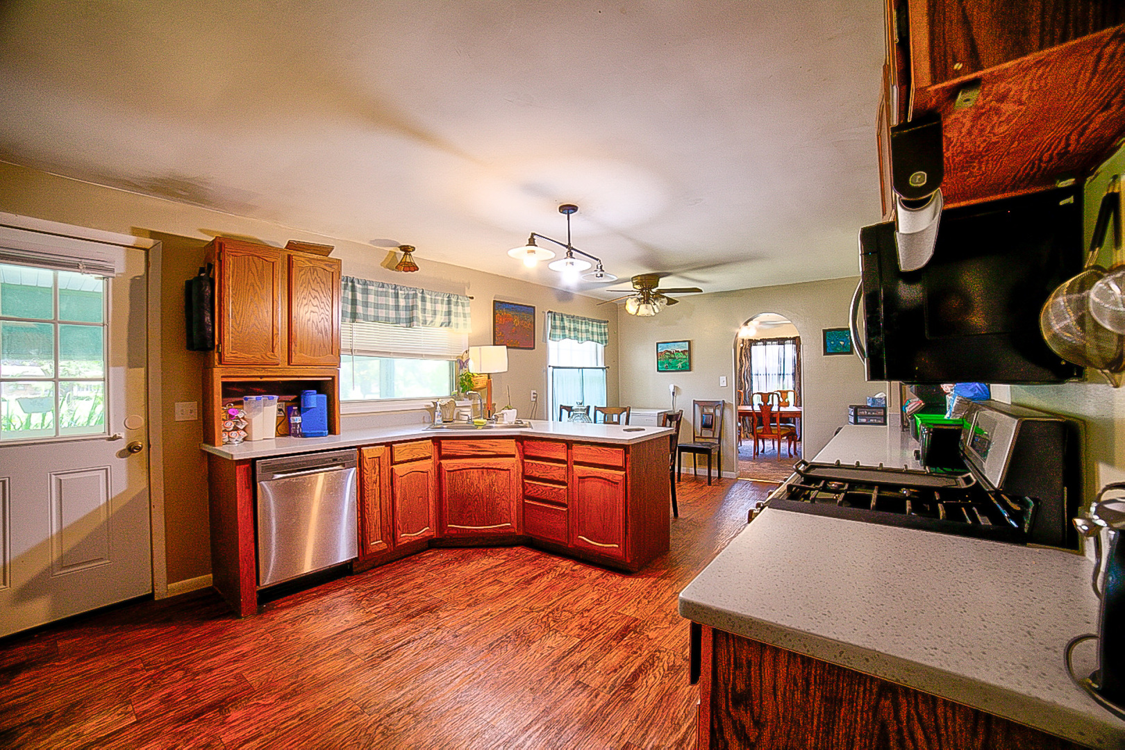 902 South 5th Street Watseka, IL 60970 - Photo 12 of 19 a kitchen with stainless steel appliances granite countertop a stove and a refrigerator