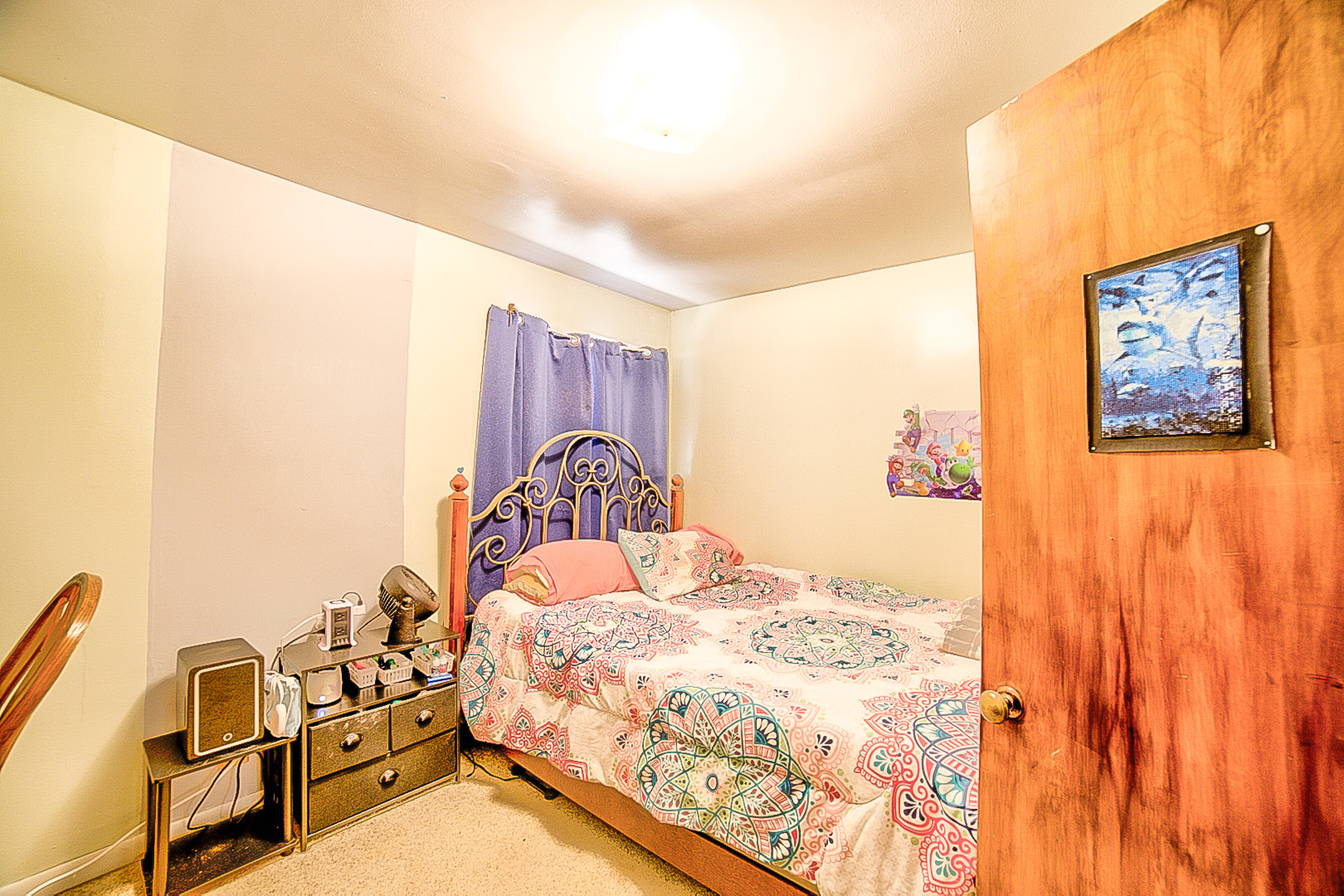 902 South 5th Street Watseka, IL 60970 - Photo 16 of 19 a bedroom with a bed and cupboard