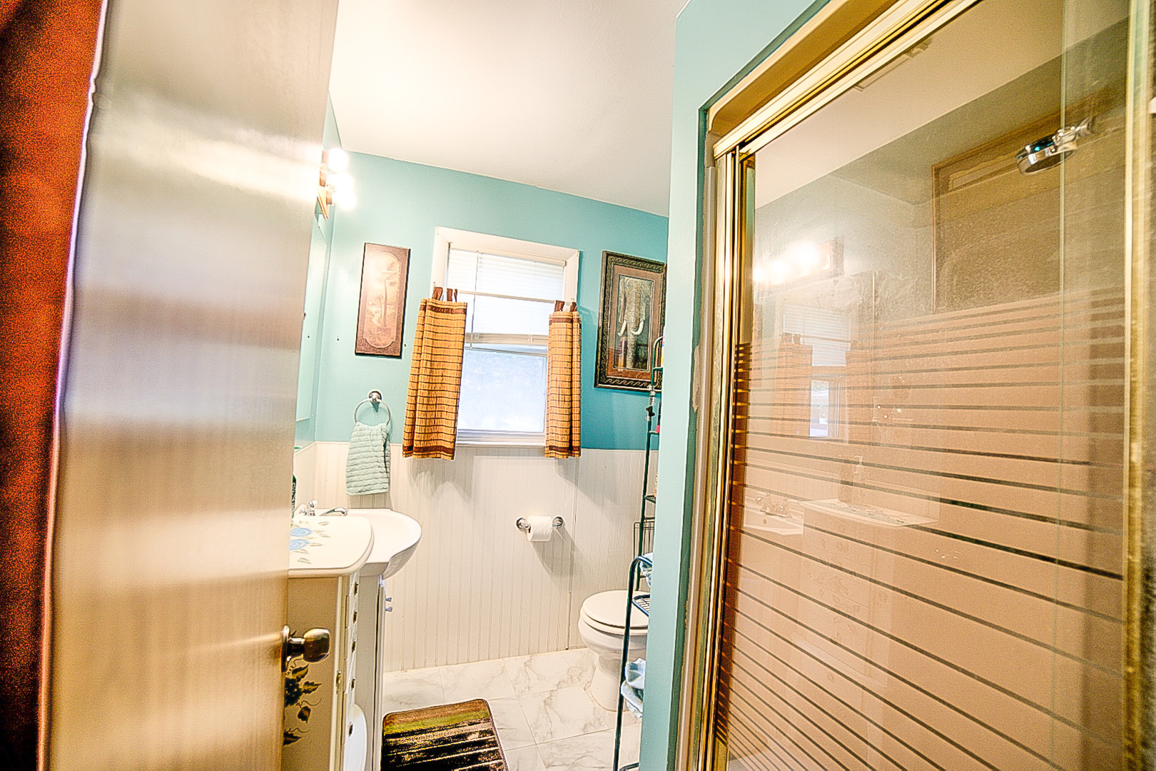 902 South 5th Street Watseka, IL 60970 - Photo 19 of 19 a bathroom with a mirror