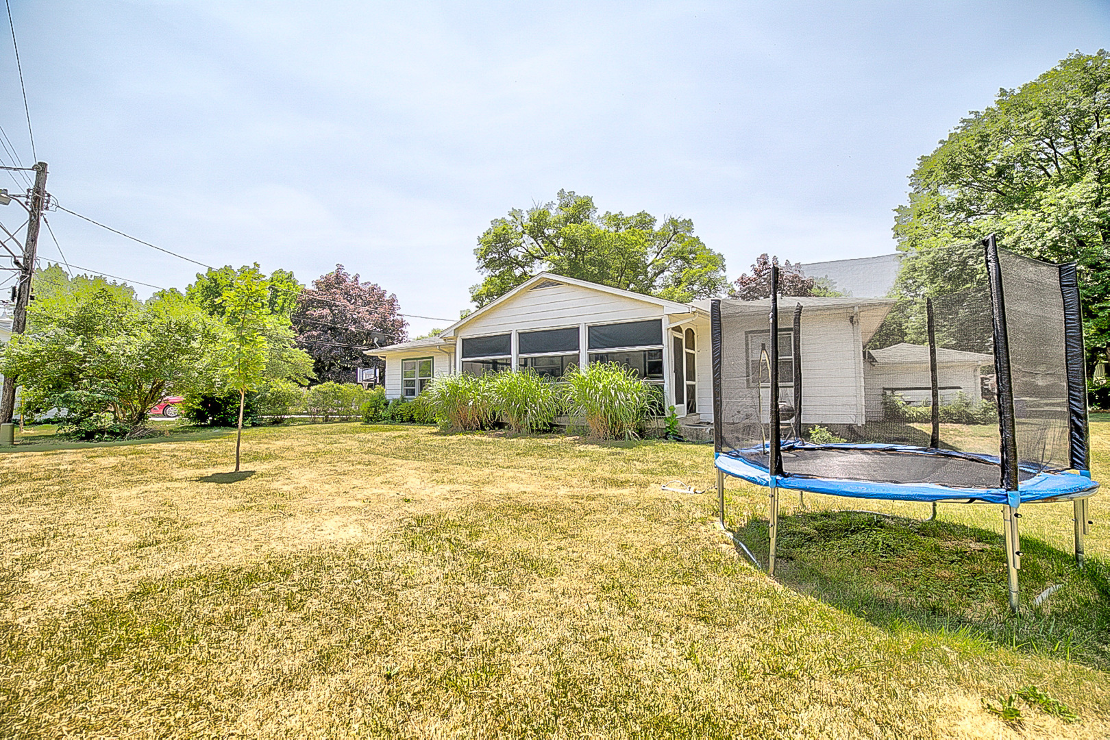 902 South 5th Street Watseka, IL 60970 - Photo 4 of 19 a swimming pool with outdoor seating and yard