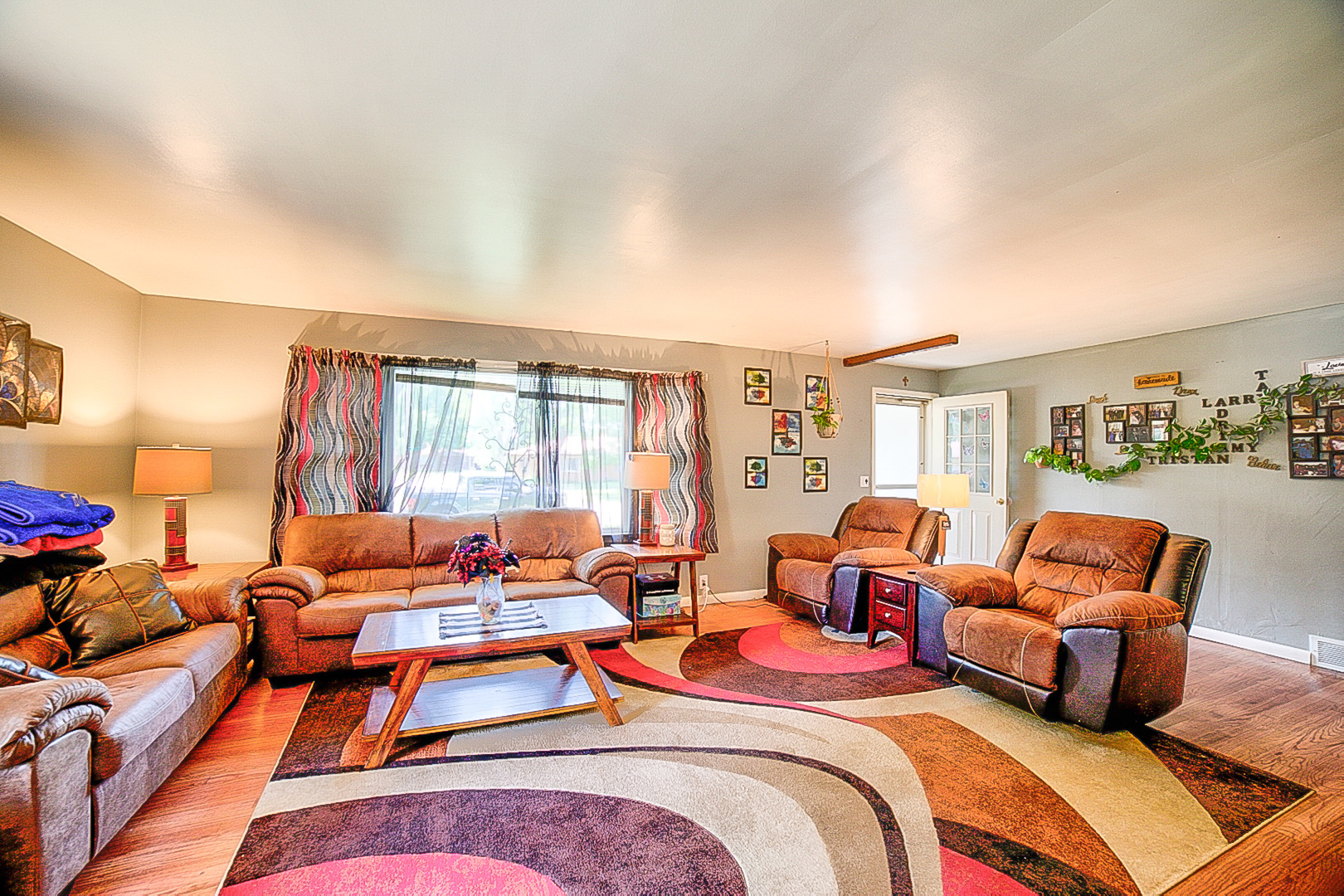 902 South 5th Street Watseka, IL 60970 - Photo 7 of 19 a bedroom with furniture and a large window