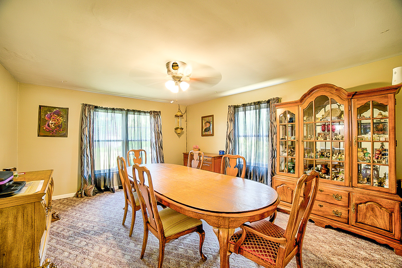 902 South 5th Street Watseka, IL 60970 - Photo 9 of 19 a view of a dining room with furniture window and wooden floor