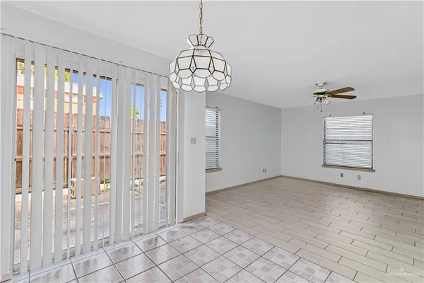 a view of a hallway with stairs