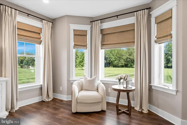 a bed room with a bed and a window