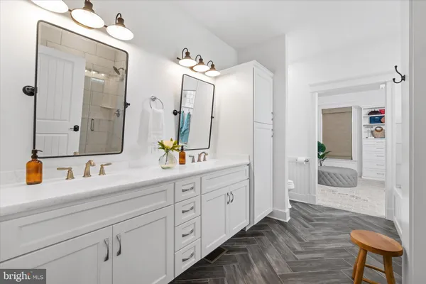a bathroom with a bathtub and a shower