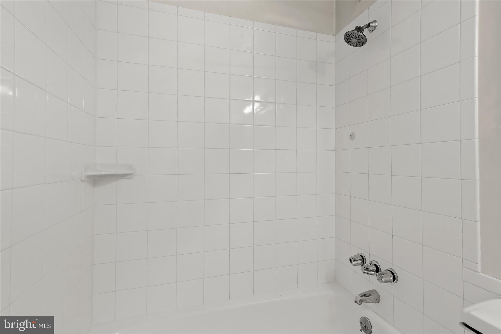 1937 Greenberry Road Baltimore, MD 21209 - Photo 15 of 29 a bathroom with a bathtub