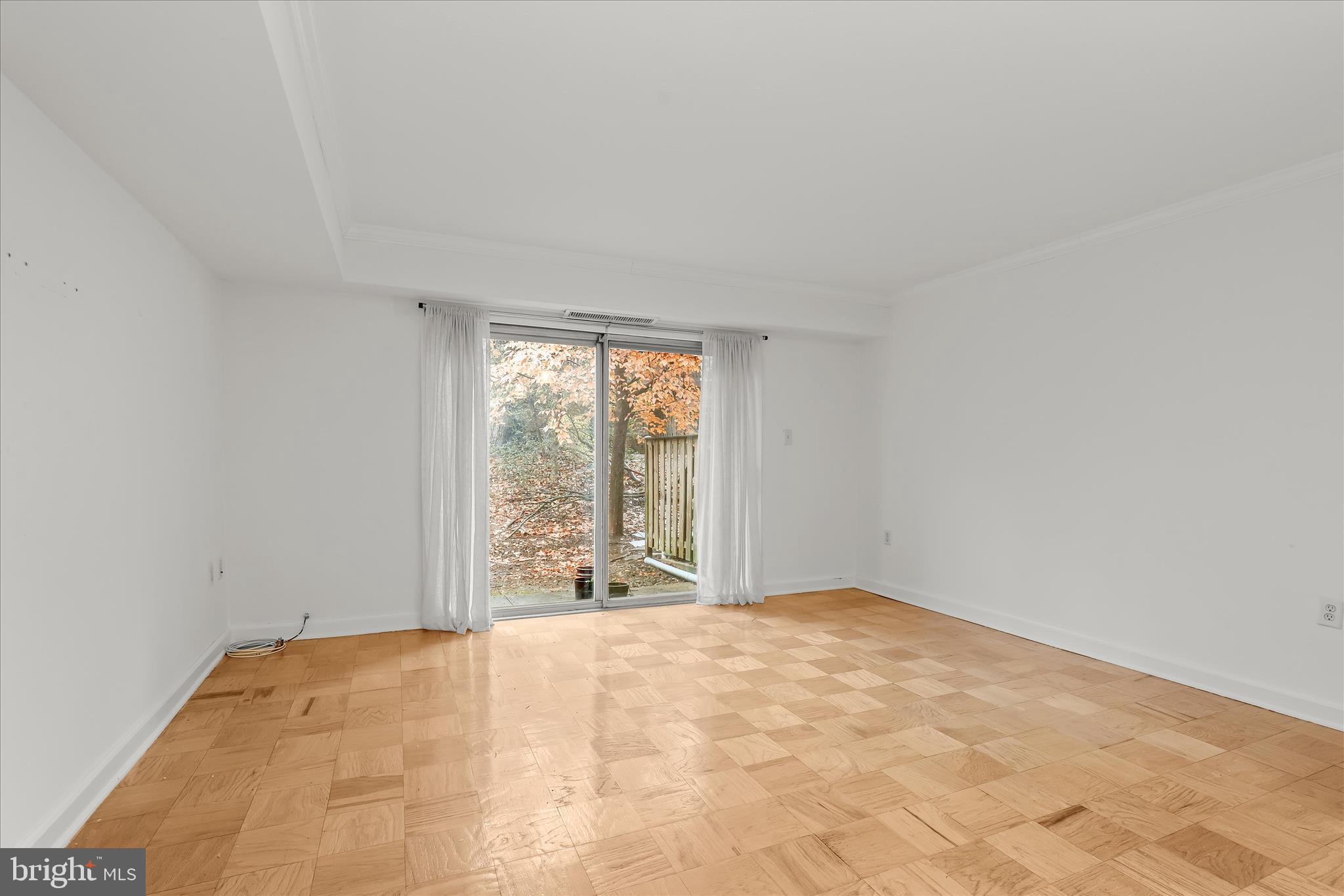1937 Greenberry Road Baltimore, MD 21209 - Photo 7 of 29 a view of an empty room with a window
