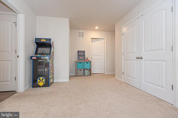 a view of an empty room with painted walls