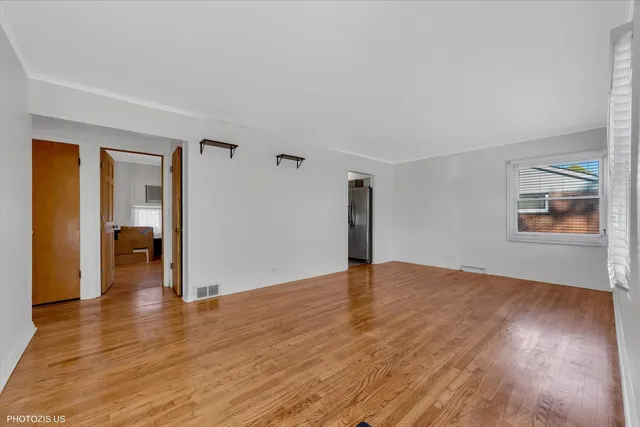 a view of an empty room and window