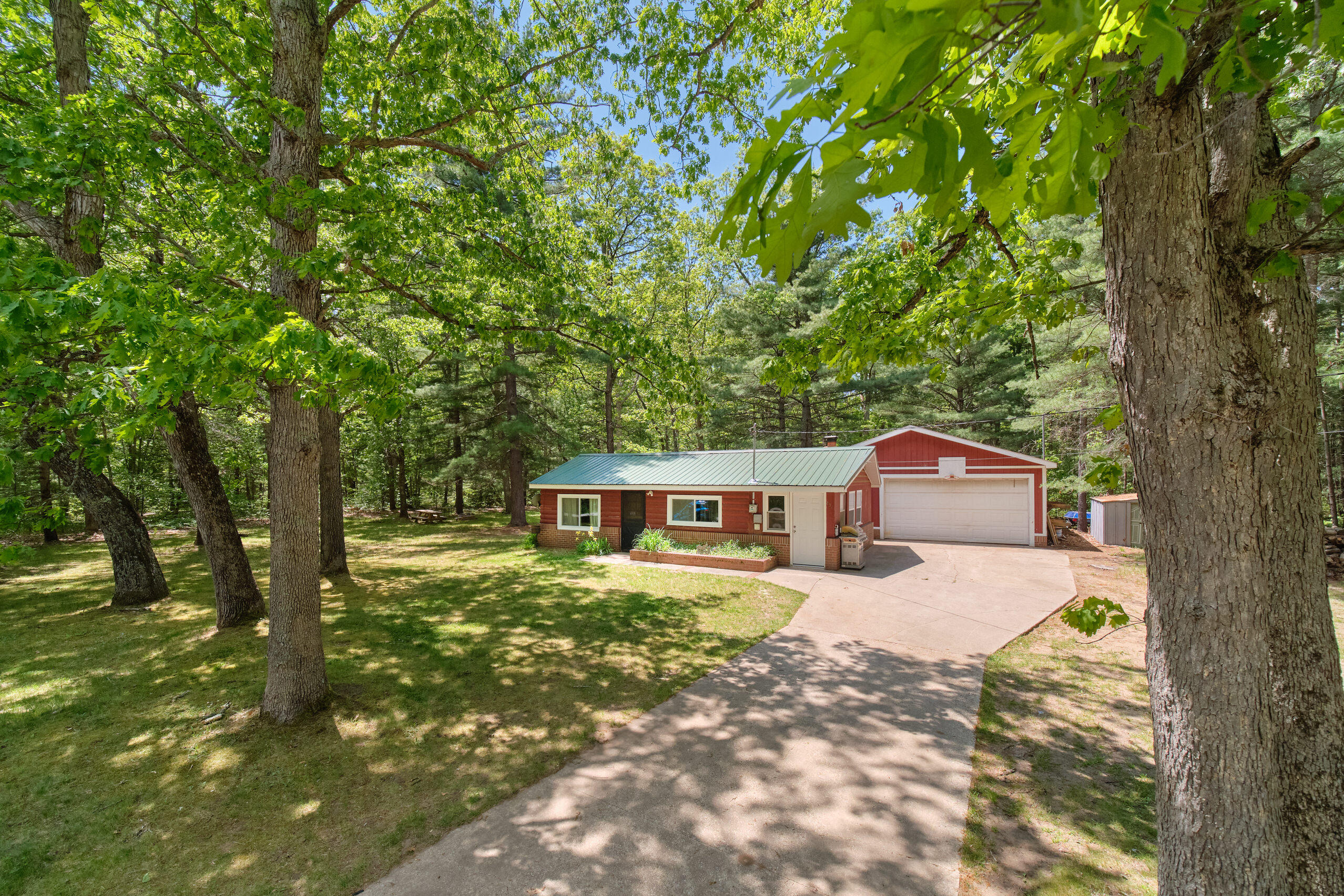 237 North Campbell Road Fountain, MI 49410 - Photo 1 of 34 Beautiful setting among tall trees