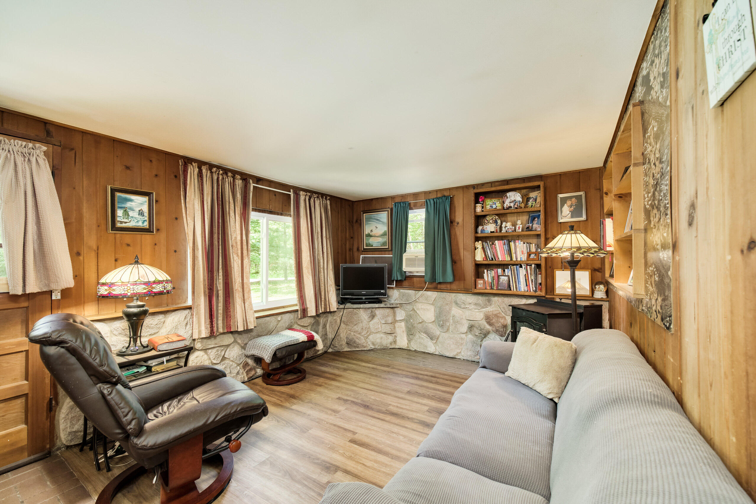 237 North Campbell Road Fountain, MI 49410 - Photo 4 of 34 Cozy living room w/built-in bookcases