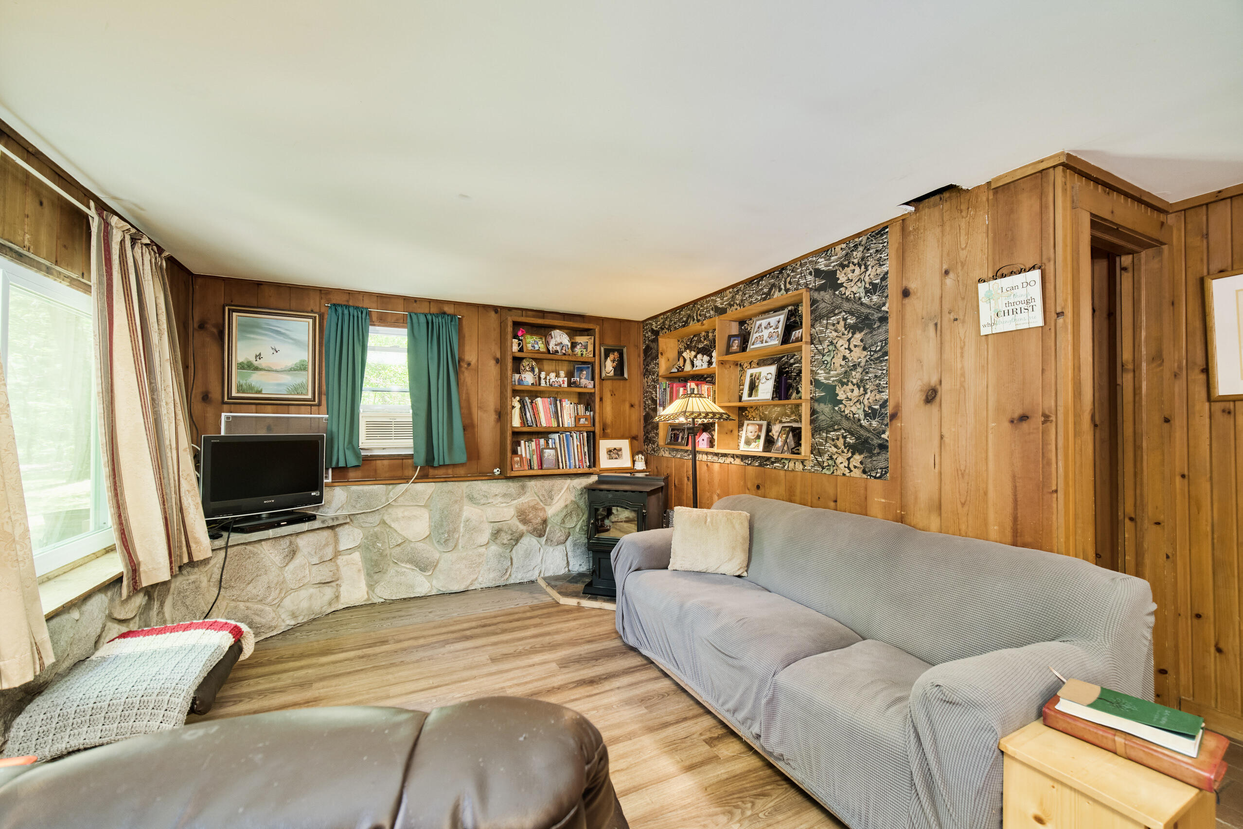 237 North Campbell Road Fountain, MI 49410 - Photo 5 of 34 Pine walls and newer flooring