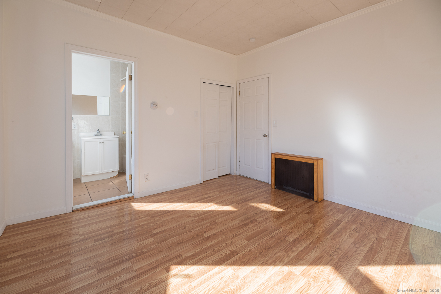 239 Forbes Avenue New Haven, CT 06512 - Photo 7 of 13 a view of empty room with wooden floor