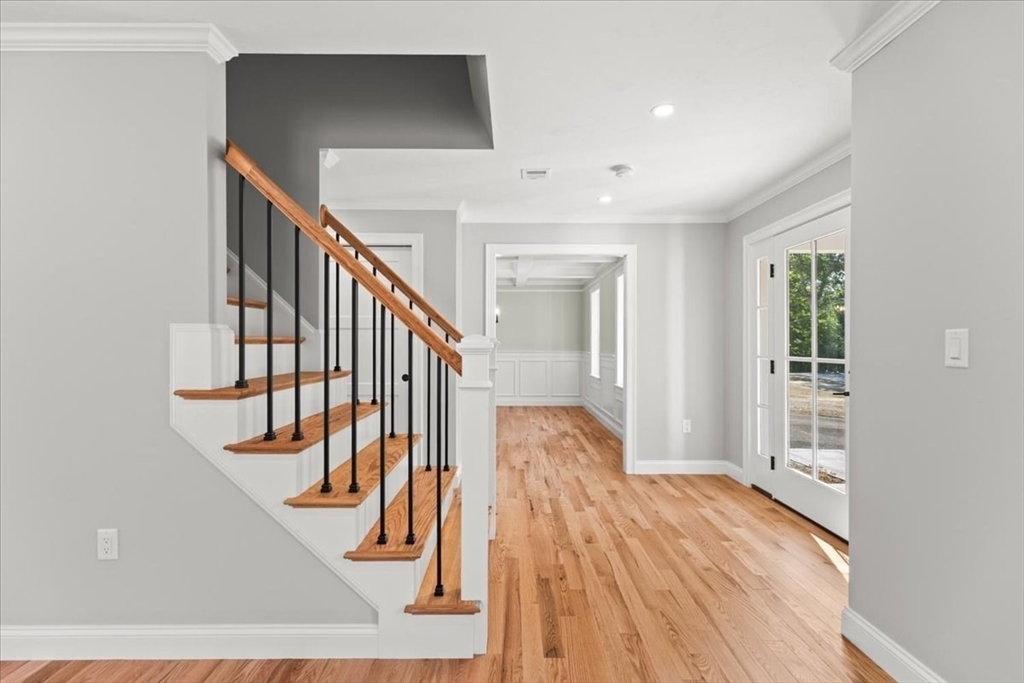 15 Elm Place Hanson, MA 02341 - Photo 12 of 27 a view of entryway and hall with wooden floor