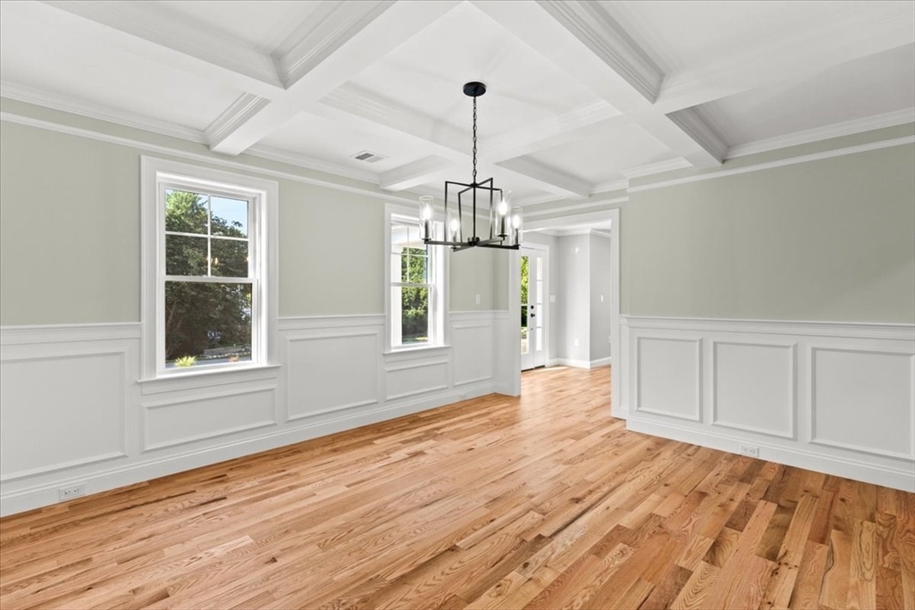 15 Elm Place Hanson, MA 02341 - Photo 8 of 27 a view of empty room with wooden floor and fan