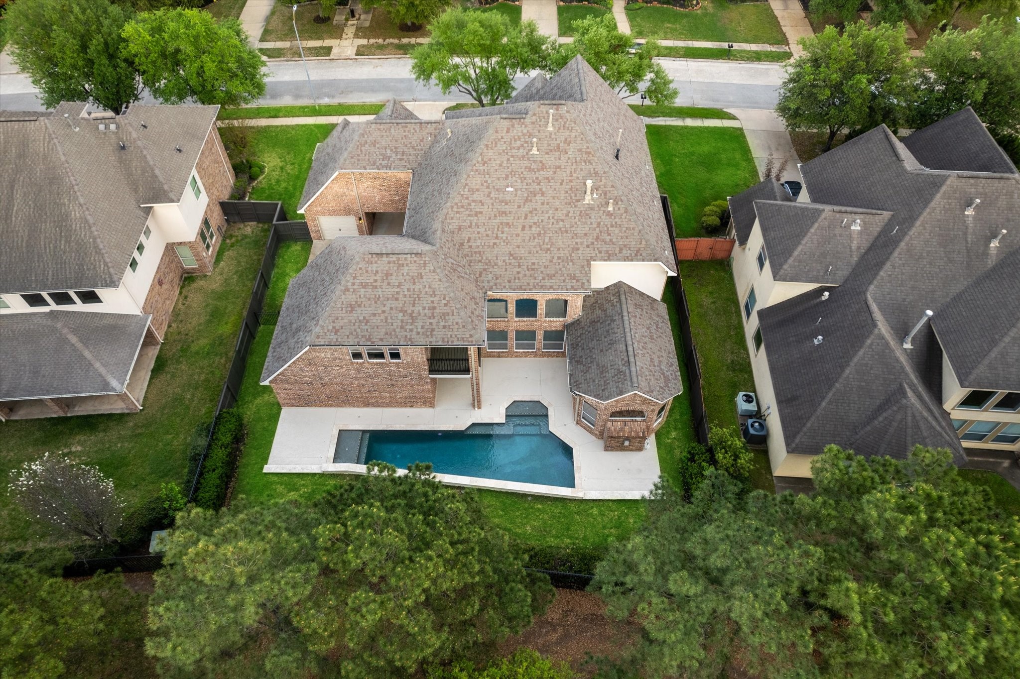 6211 Alameda Point Lane Houston, TX 77041 - Photo 3 of 50 Aerial view showcasing the expansive park-like lot, pool, and serene greenbelt setting.