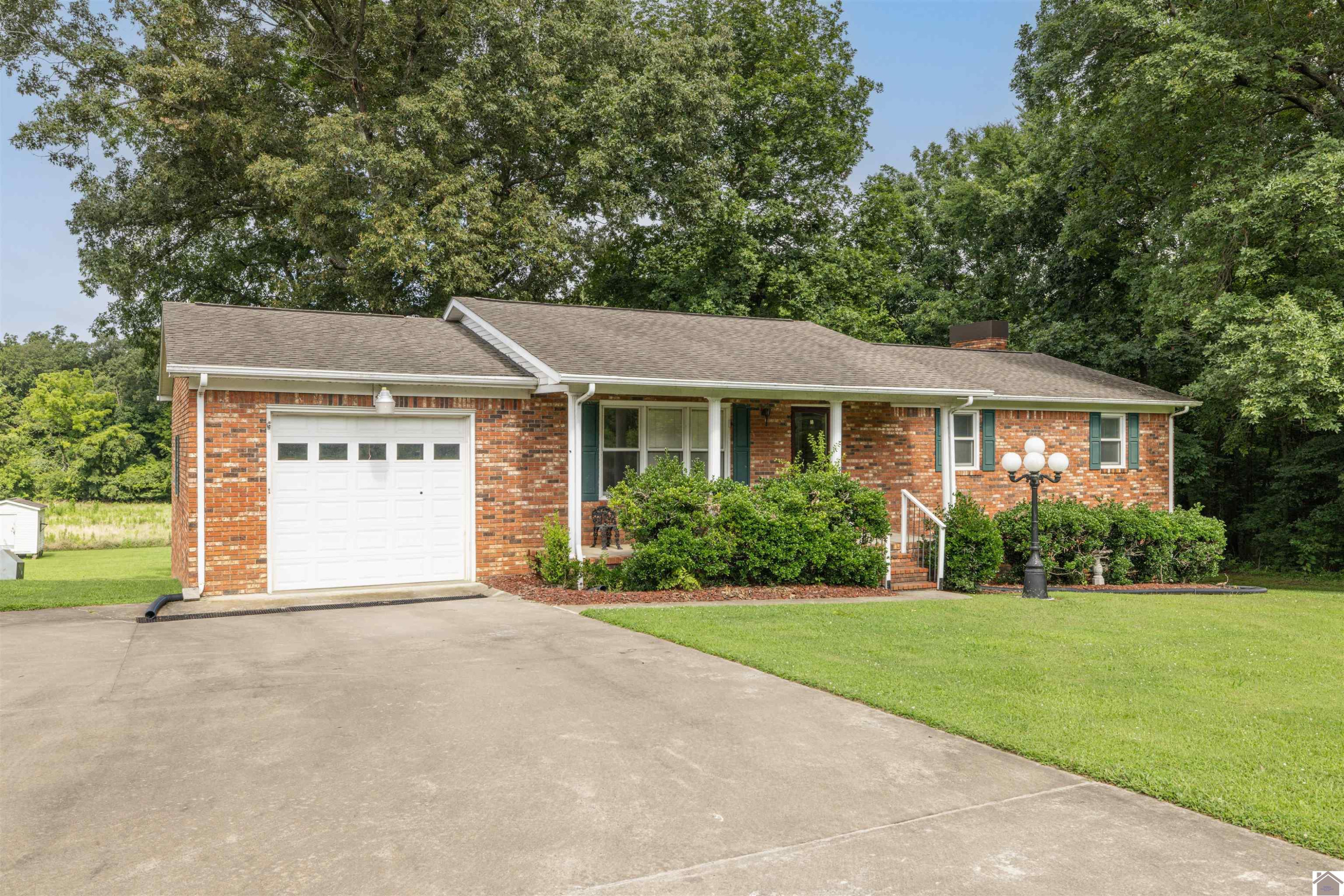 1957 Coopertown Road Murray, KY 42071 - Photo 2 of 34 Mature Landscaping