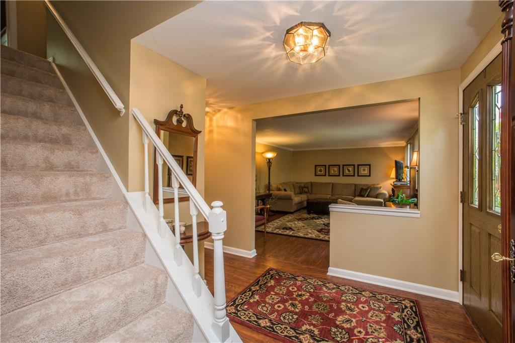 2344 Harrow Road Pittsburgh, PA 15241 - Photo 2 of 25 The updated front door opens to a spacious foyer which flows into the living room, dining room and kitchen.