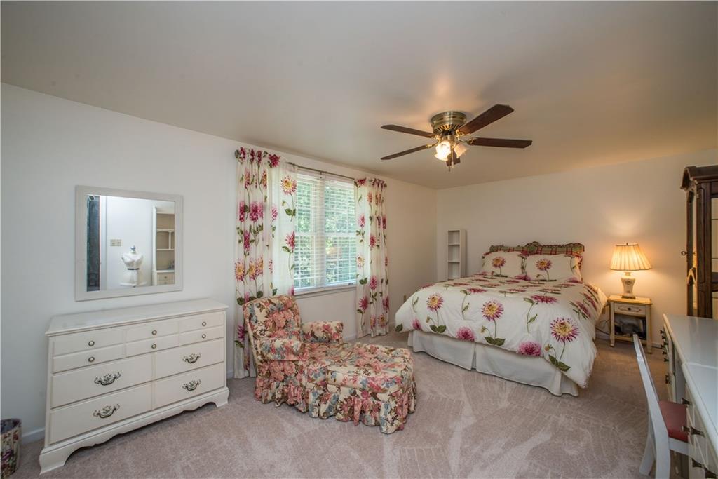 2344 Harrow Road Pittsburgh, PA 15241 - Photo 17 of 25 The second bedroom is very spacious with a overhead fan/light combo, with neutral paint and carpet colors.
