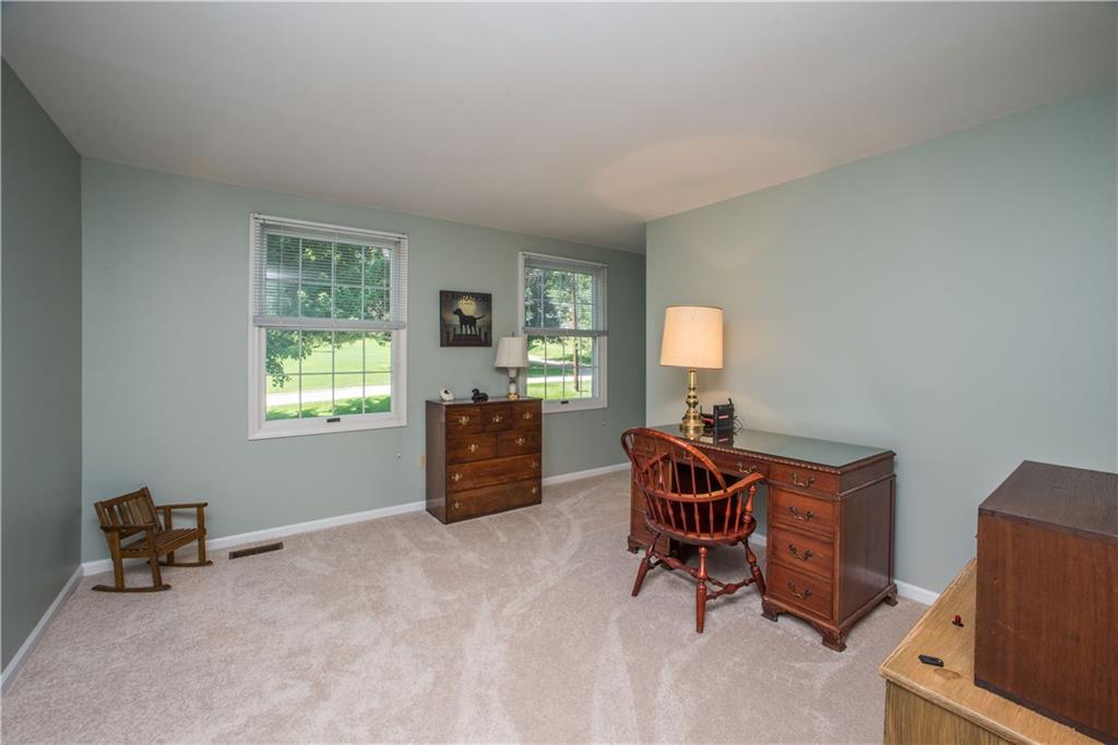 2344 Harrow Road Pittsburgh, PA 15241 - Photo 19 of 25 The forth bedroom has multiple uses. For now it has been used as a home office. Serene paint color with neutral carpets and great natural light.