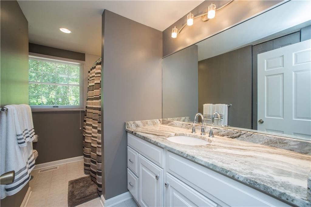 2344 Harrow Road Pittsburgh, PA 15241 - Photo 20 of 25 This spacious bathroom has been updated also. Tons of counter space on their new vanity counter top and recessed lighting.