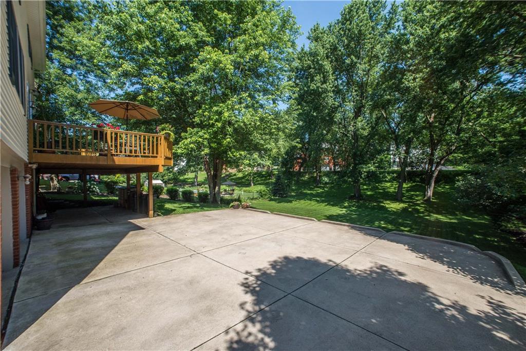 2344 Harrow Road Pittsburgh, PA 15241 - Photo 24 of 25 There is a two car integral garage with a LARGE parking pad in the back.