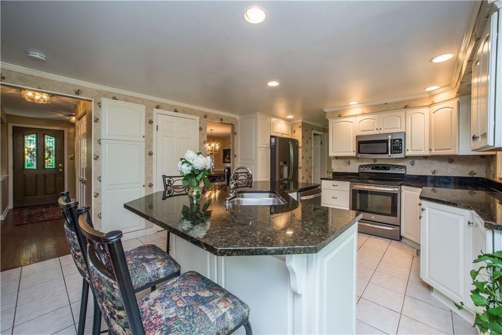 2344 Harrow Road Pittsburgh, PA 15241 - Photo 10 of 25 This kitchen has a ton of storage and cabinetry with recessed lighting, making this room very bright!!