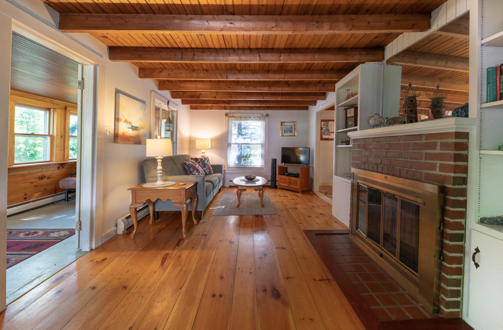 76 Ledgewood Road Portland, ME 04108 - Photo 5 of 21 Original exposed beams fireplace
