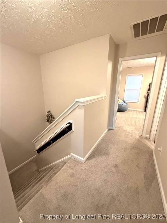 210 Roanoke Drive Raeford, NC 28376 - Photo 13 of 29 a view of a hallway with staircase
