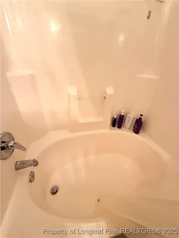 a bathroom with a tub