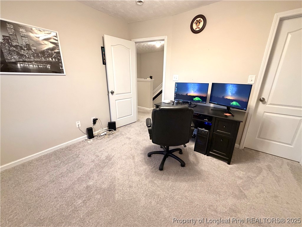 210 Roanoke Drive Raeford, NC 28376 - Photo 22 of 29 a workspace with furniture and window