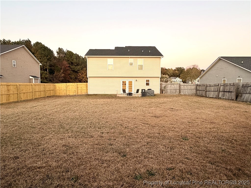 210 Roanoke Drive Raeford, NC 28376 - Photo 28 of 29 a view of a house with a outdoor space