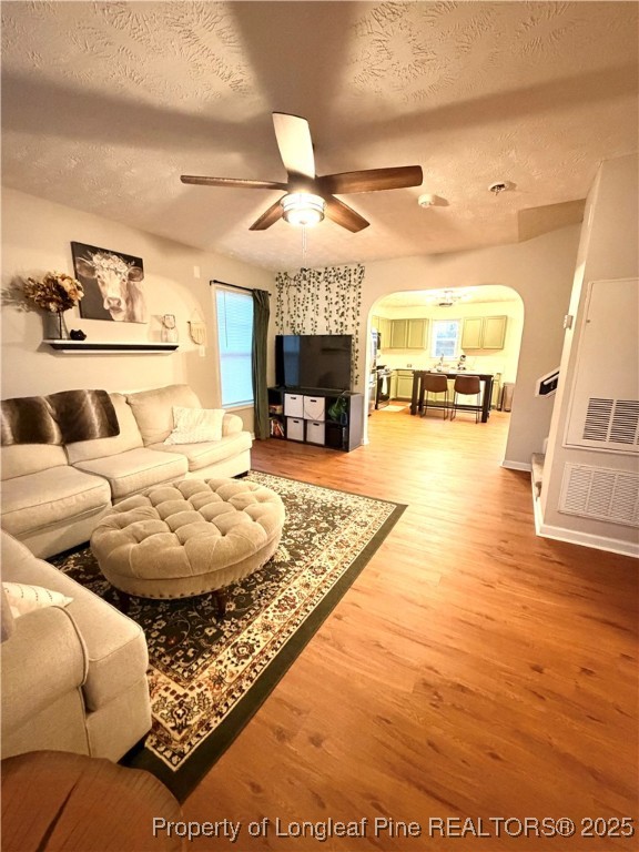 210 Roanoke Drive Raeford, NC 28376 - Photo 5 of 29 a living room with furniture and a fireplace