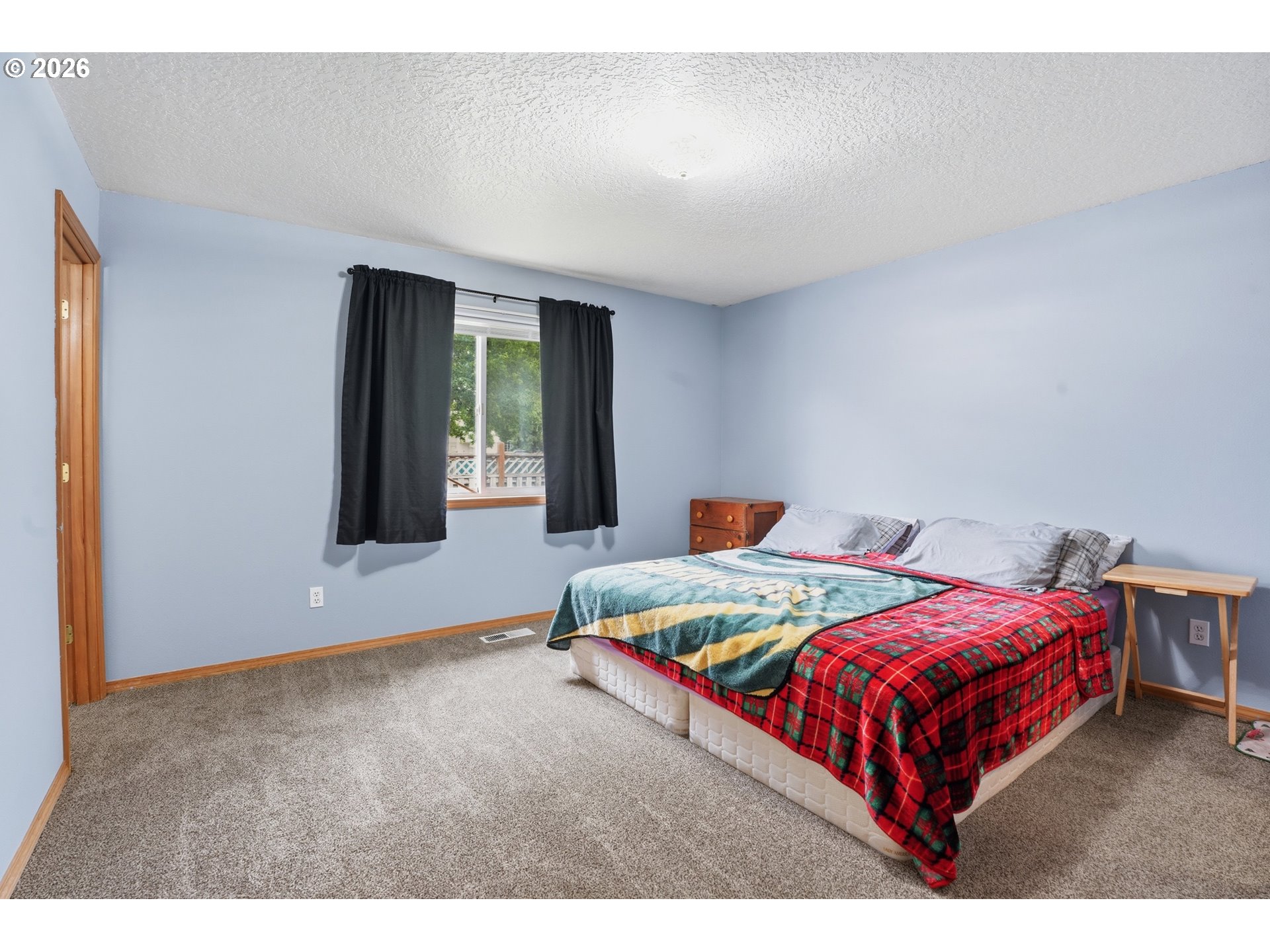 105 Toliver Road Molalla, OR 97038 - Photo 14 of 34 a bedroom with a bed and window