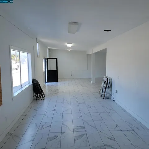 a front view of a house with yard