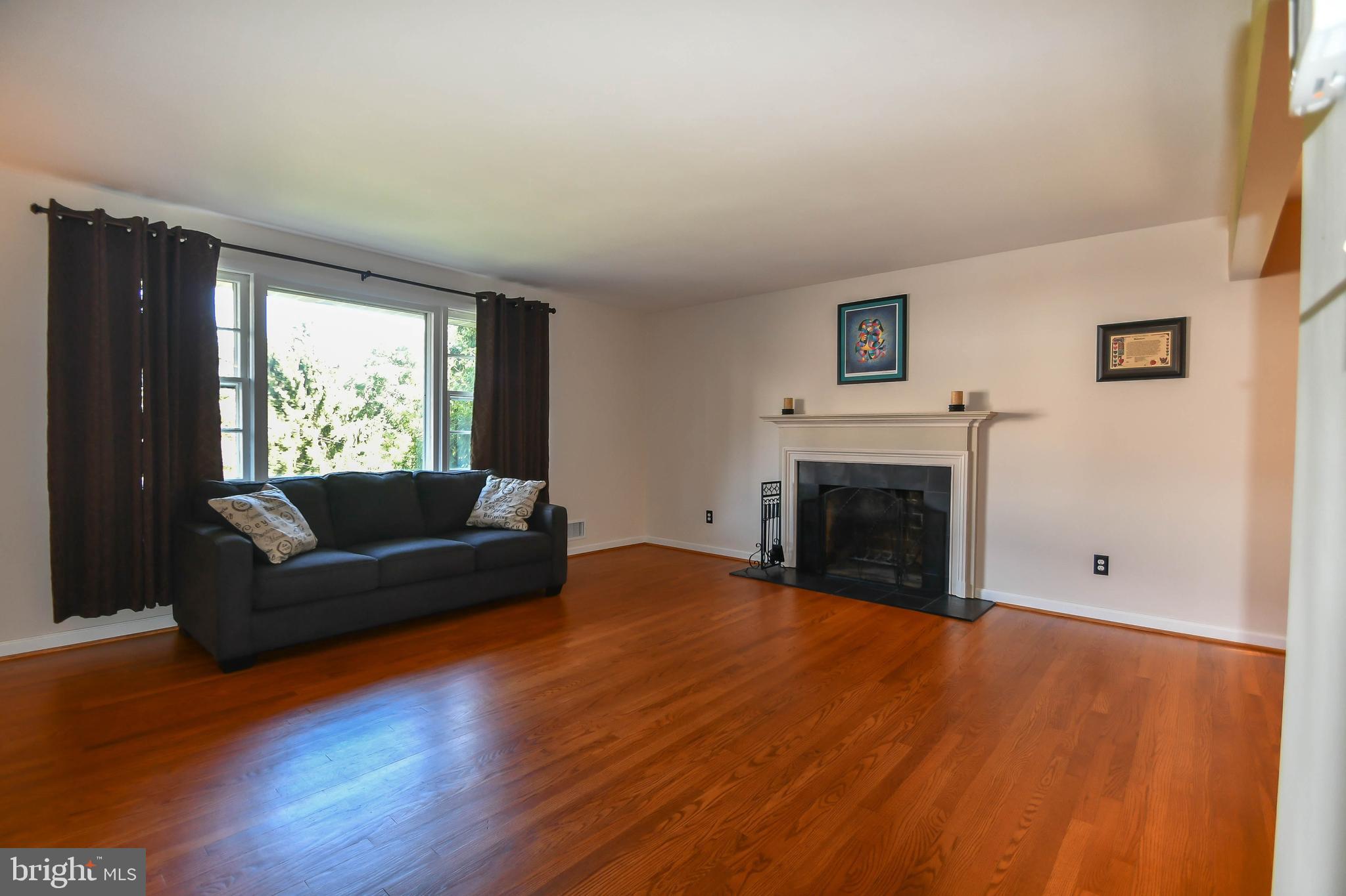 13 Edgeclift Road Towson, MD 21286 - Photo 10 of 34 Living Room with Wood Burning Fireplace