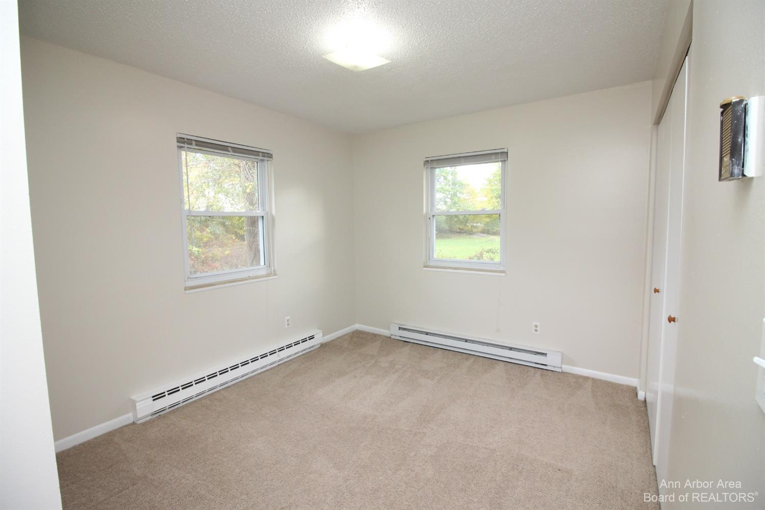 4648 Dexter-Pinckney Road Dexter, MI 48130 - Photo 20 of 44 Bedroom three