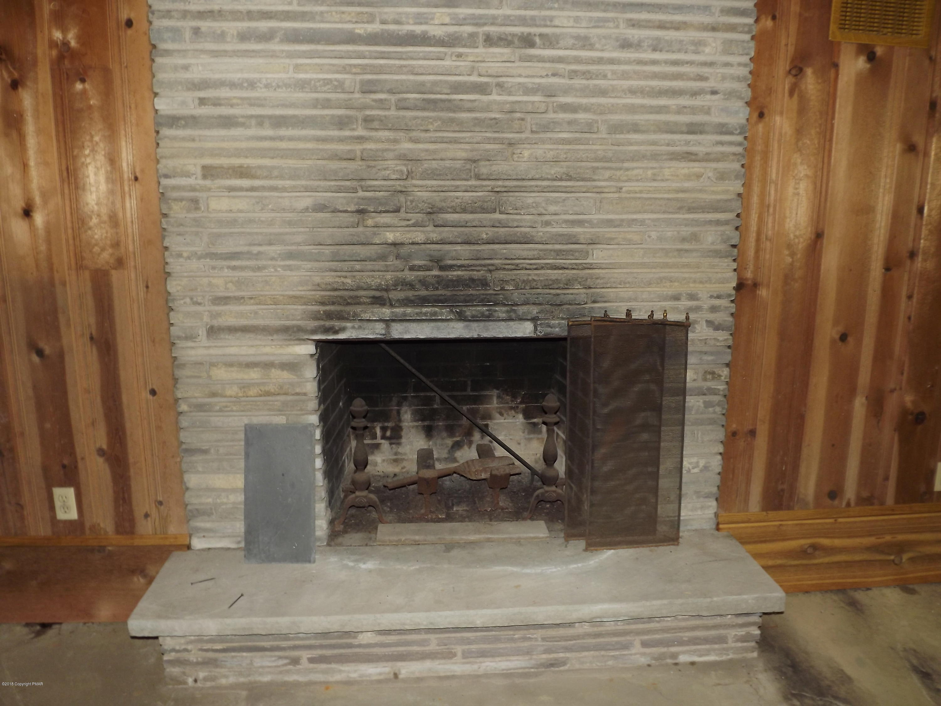5610 Glenbrook Road Stroudsburg, PA 18360 - Photo 24 of 26 Basement Fireplace