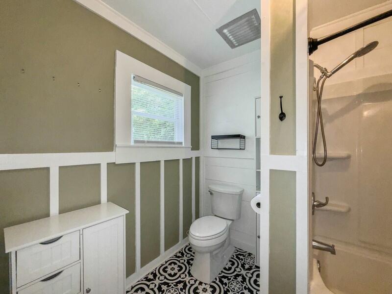 383 North Booker Street Crestview, FL 32536 - Photo 25 of 36 a bathroom with a toilet sink and shower