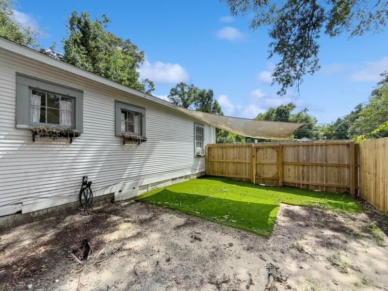 383 North Booker Street Crestview, FL 32536 - Photo 28 of 36 a view of a backyard