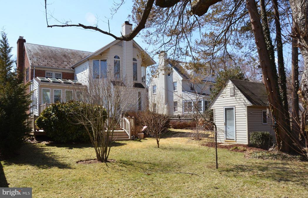 5603 Ridgefield Road Bethesda, MD 20816 - Photo 2 of 30 a front view of a house with a yard