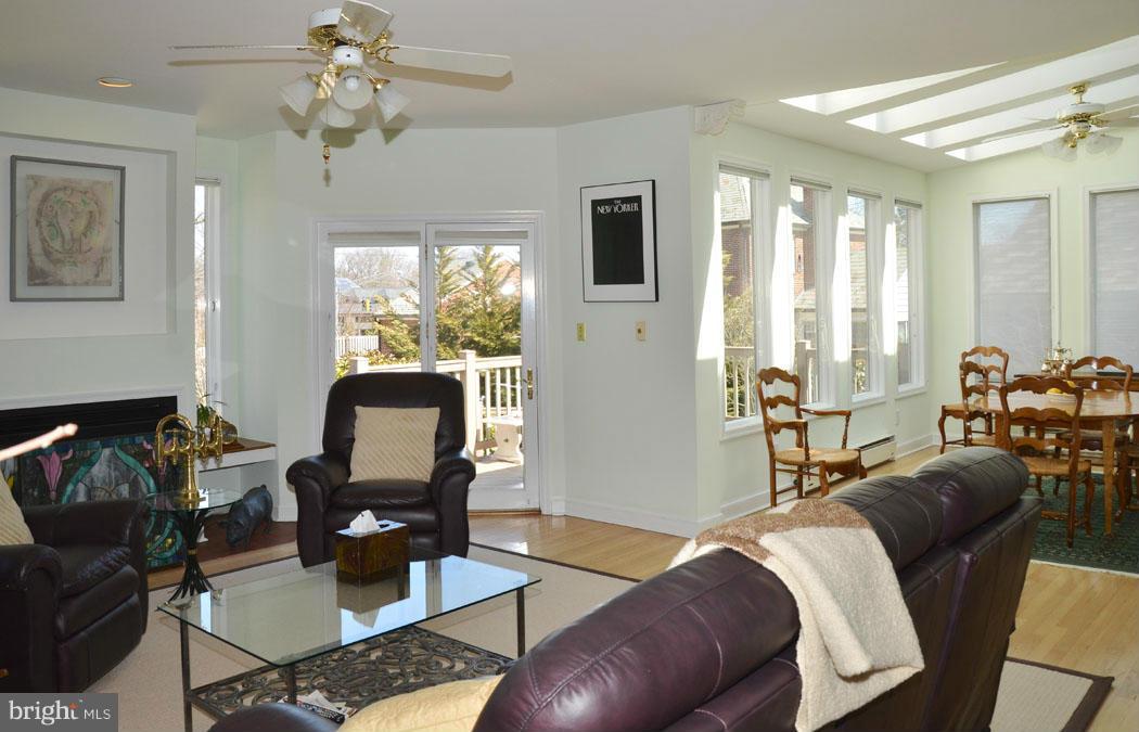 5603 Ridgefield Road Bethesda, MD 20816 - Photo 15 of 30 a living room with furniture fireplace and a large window